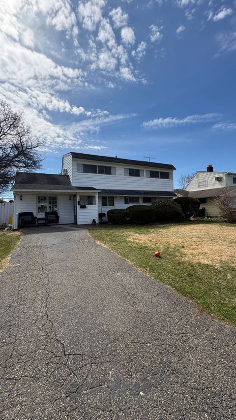 Photo of 20 Basket Ln, Hicksville, NY 11801 (MLS # 11683369)
