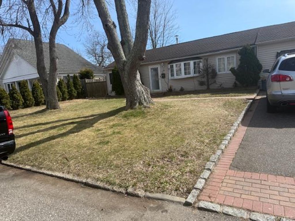 Photo of 30 Tamarack Street, Central Islip, NY 11722 (MLS # 11681828)