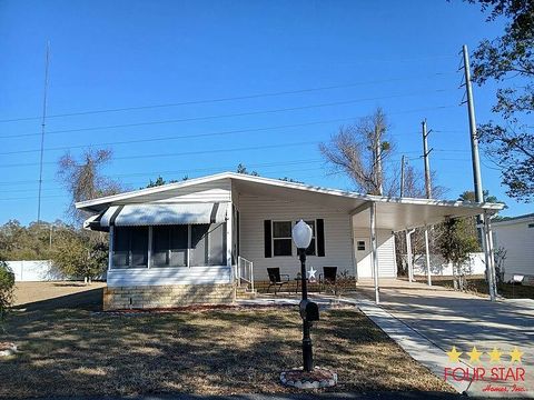 Photo of 435 Kingslake Dr, DeBary, FL 32713 (MLS # 11656202)