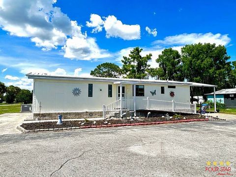 Photo of 152 Formosa Island Rd, Leesburg, FL 34788 (MLS # 11835255)