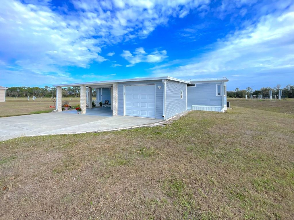 Photo of 955 Avanti Way, North Fort Myers, FL 33917 (MLS # 11651463)