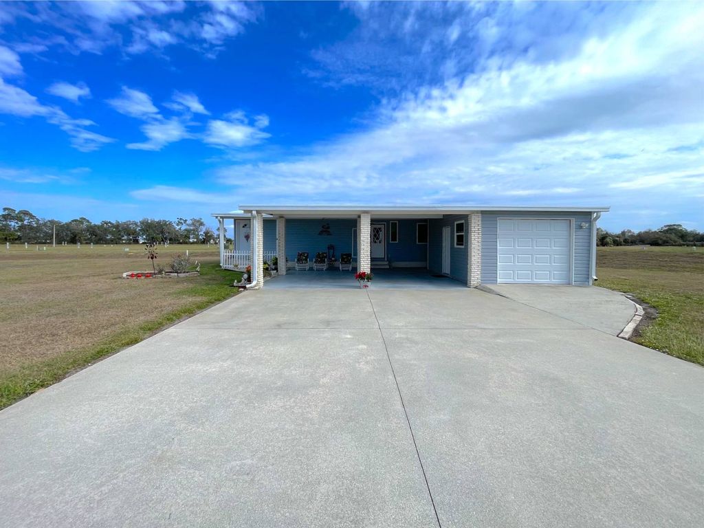 Photo of 955 Avanti Way, North Fort Myers, FL 33917 (MLS # 11651463)