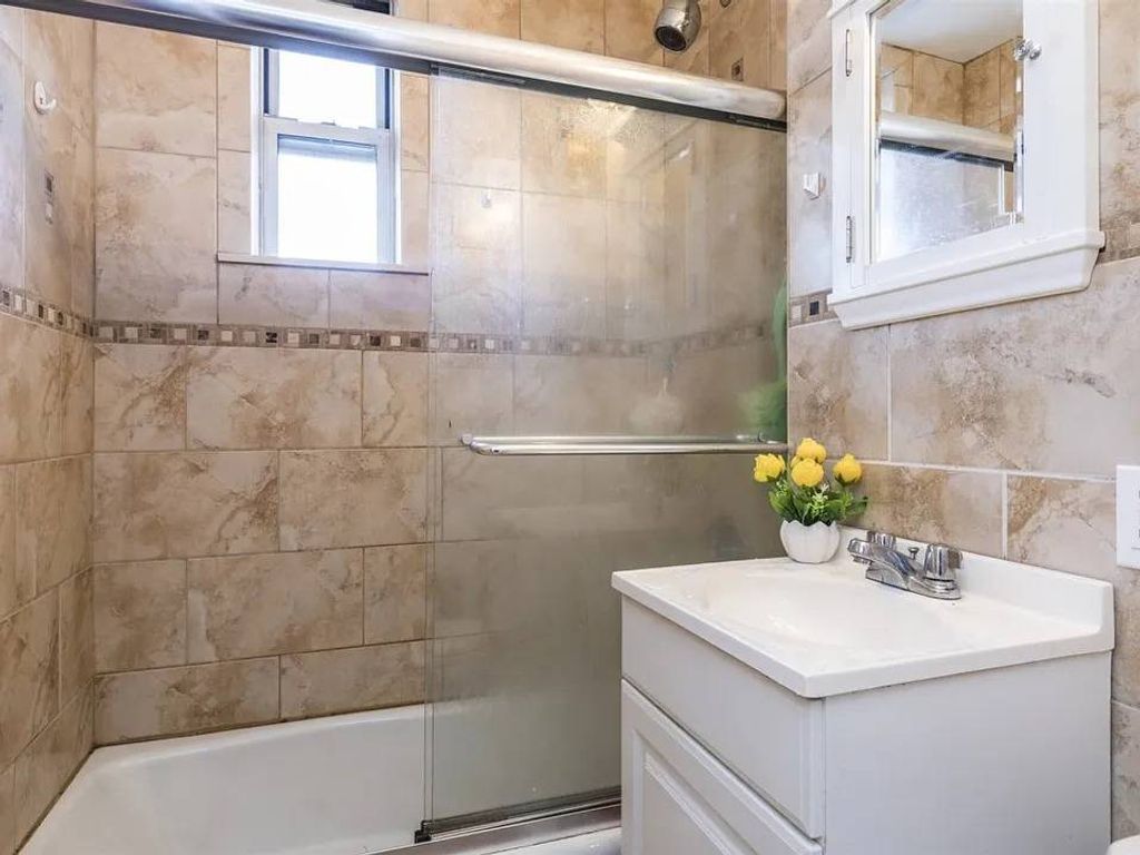 Photo of 19214 station Road, Flushing, NY 11358 (MLS # 11621726)