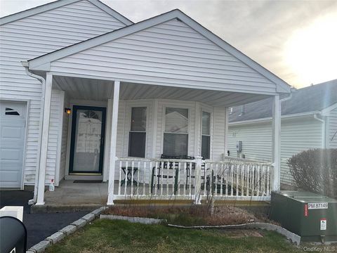 Photo of 409 Village Circle N Cir, Manorville, NY 11949 (MLS # 11616926)