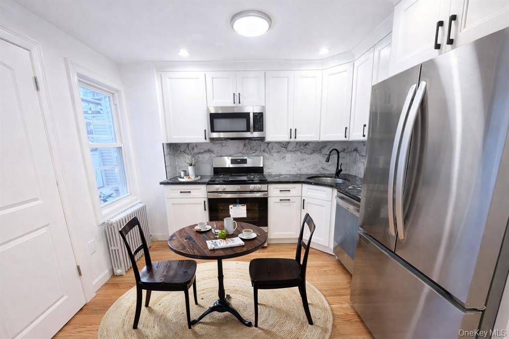 Photo of 15302 Foch Blvd, Jamaica, NY 11434 (MLS # 11631141)