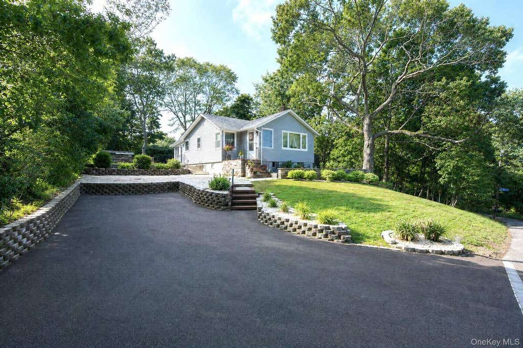 Photo of 69 Hill Drive, Riverhead, NY 11901 (MLS # 11937146)