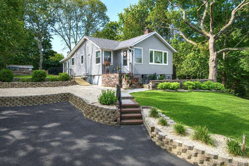 Photo of 69 Hill Drive, Riverhead, NY 11901 (MLS # 11937146)