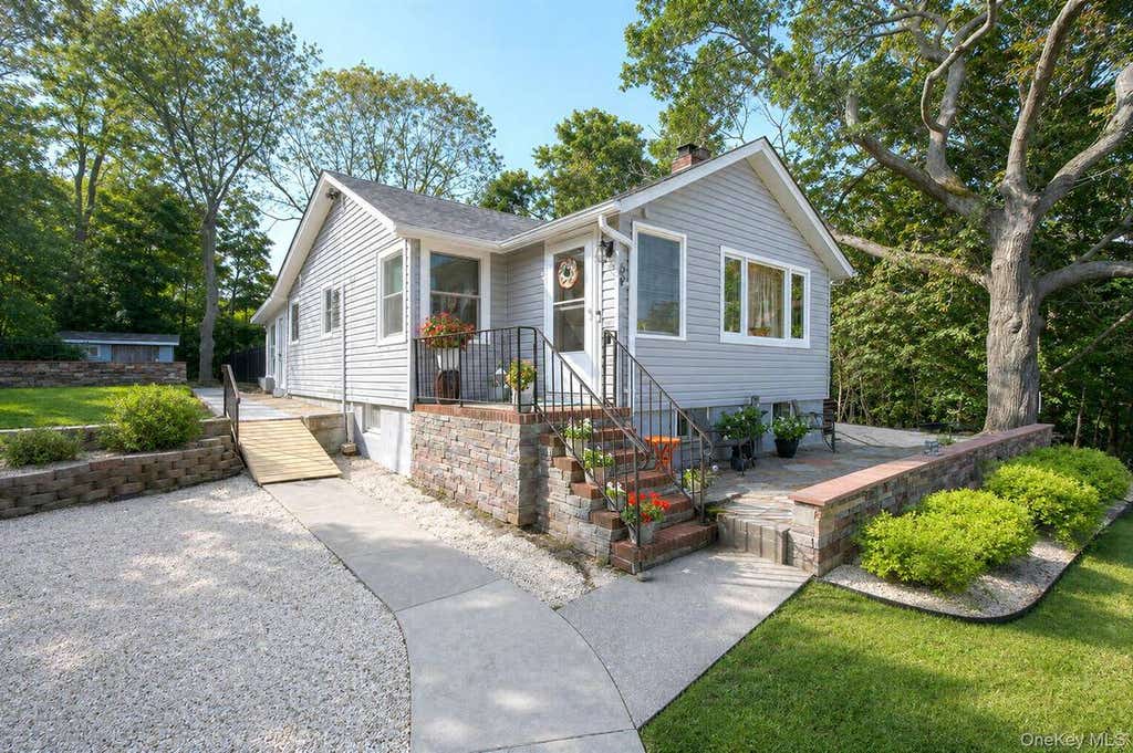 Photo of 69 Hill Drive, Riverhead, NY 11901 (MLS # 11937146)