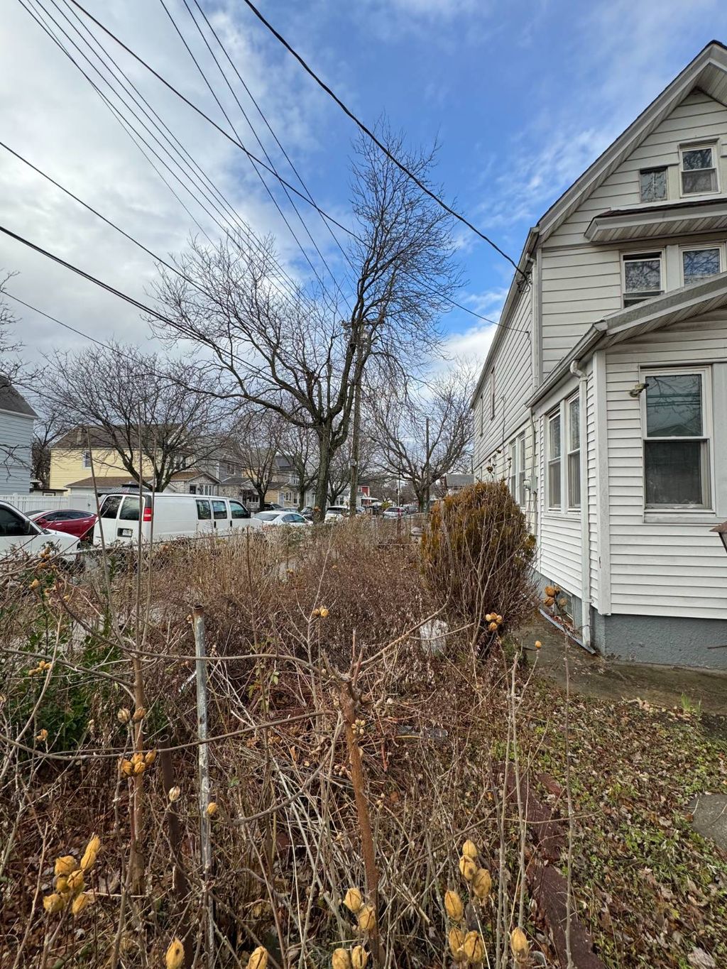 Photo of 14703 111th Avenue, Jamaica, NY 11435 (MLS # 11620833)