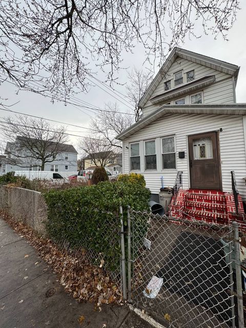 Photo of 14703 111th Avenue, Jamaica, NY 11435 (MLS # 11620833)