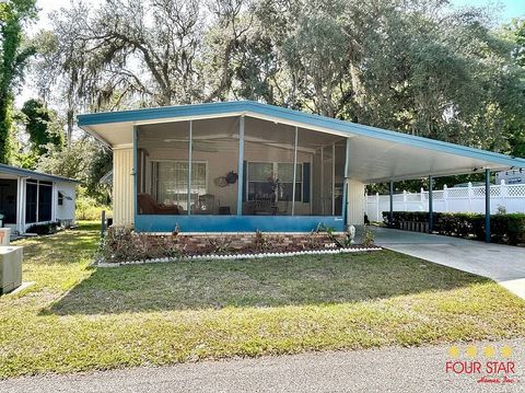 Photo of 7 Kings Blvd, Leesburg, FL 34748 (MLS # 11738658)