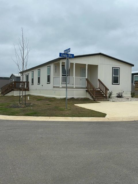 Photo of 2203 Cielo Rio, San Antonio, TX 78223 (MLS # 11797476)