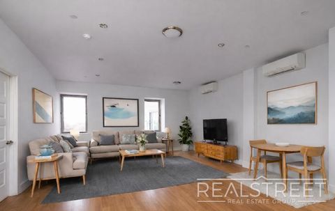 Photo of 9002 Queens Blvd #611, ELMHURST, NY 11373 (MLS # 11624136)