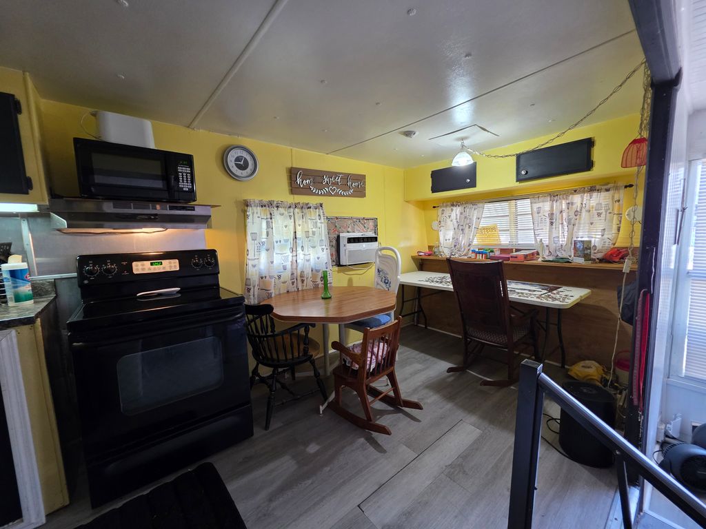 Photo of 34640 Lillian St, Zephyrhills, FL 33541 (MLS # 11678346)