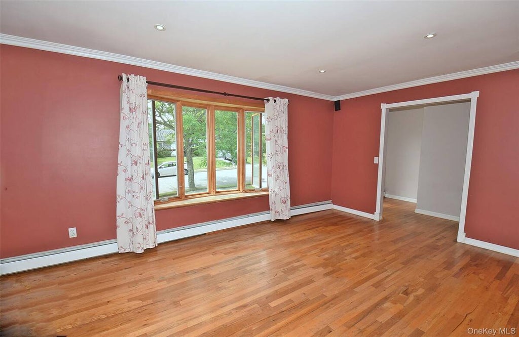 Photo of 27 Naples Avenue, Central Islip, NY 11722 (MLS # 11848412)