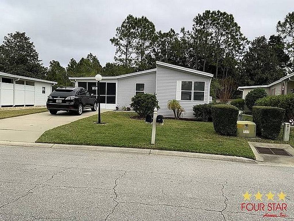 Photo of 57 Green Forest Dr, Ormond Beach, FL 32174 (MLS # 11740746)