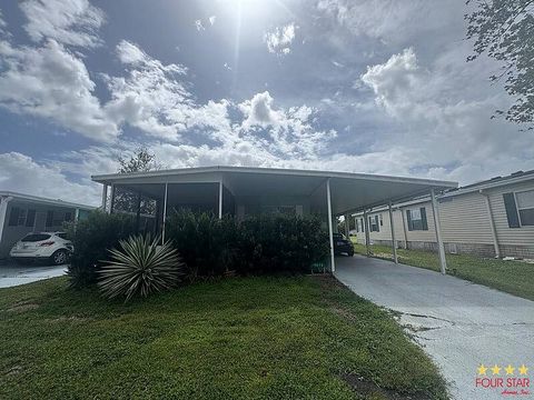 Photo of 14614 Firestone St, Orlando, FL 32826 (MLS # 11656174)