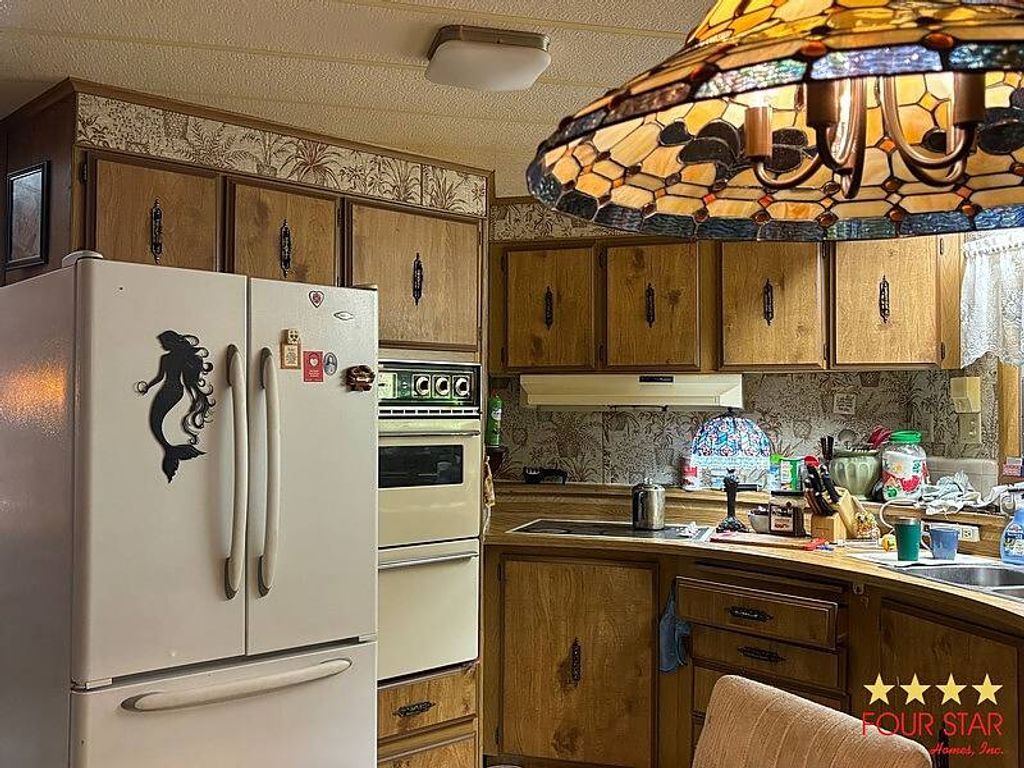 Photo of 2401 Greenhedge Dr, Orange City, FL 32763 (MLS # 11740625)
