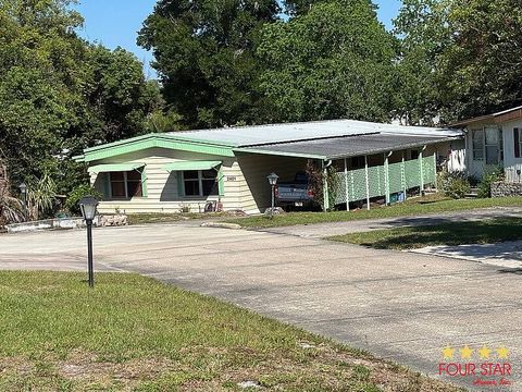 Photo of 2401 Greenhedge Dr, Orange City, FL 32763 (MLS # 11740625)
