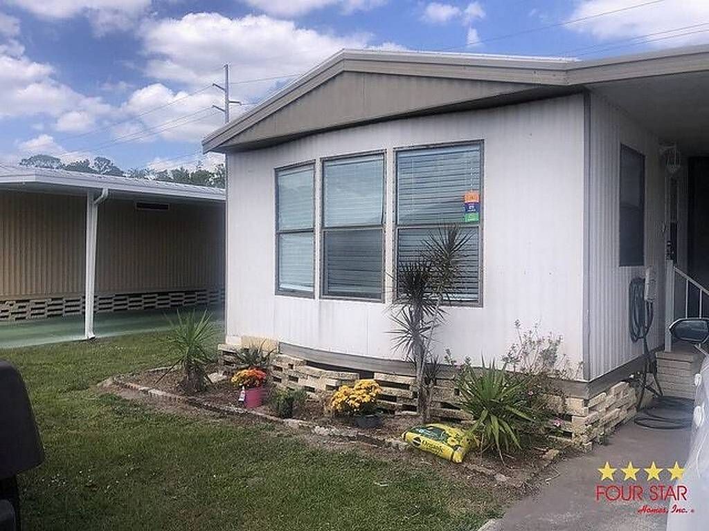 Photo of 1264 Whisper Lake Blvd #30, Sebring, FL 33870 (MLS # 11774574)