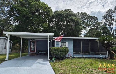 Photo of 2209 Primavera Ave, Port Orange, FL 32129 (MLS # 11716627)