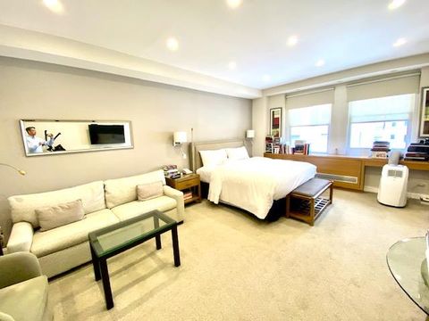 Photo of 111 East 56th Street #907, New York, NY 10022 (MLS # 11668735)