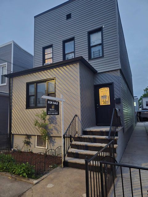Photo of 9722 92 St, queens, NY 11416 (MLS # 11738210)