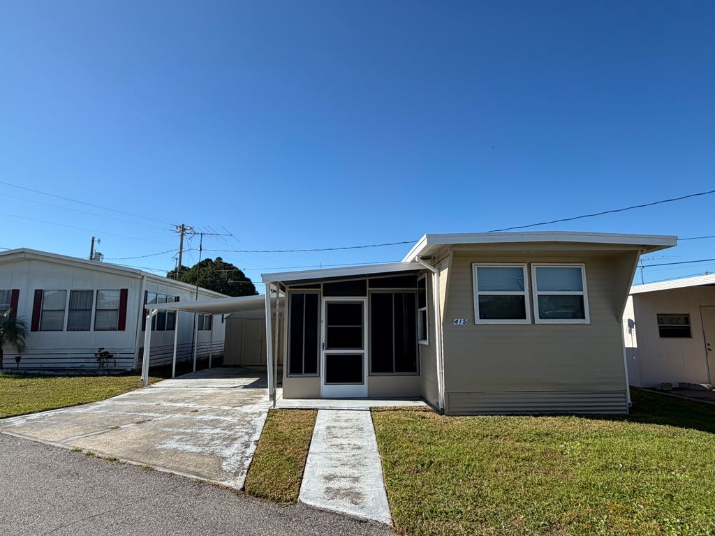 Photo of 415 Cobalt Ave, Lakeland, FL 33815 (MLS # 11619907)