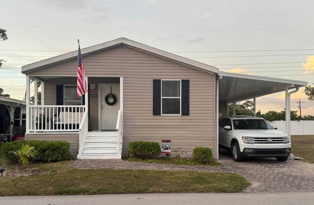 Photo of 445 Avanti Way Blvd, North Fort Myers, FL 33917 (MLS # 11619816)