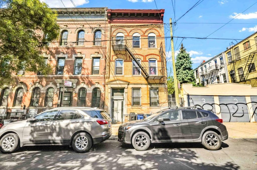 Photo of 1823 Bleecker Street, Ridgewood, NY 11385 (MLS # 11592209)