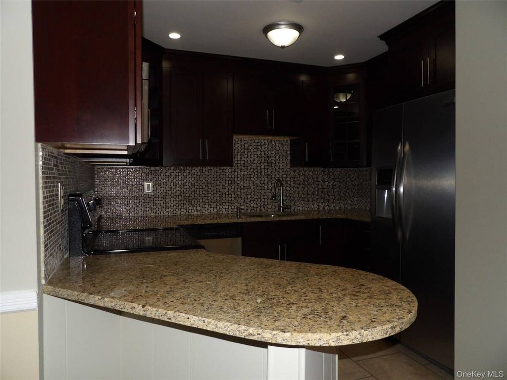 Photo of 26 Greenmeadow Drive, Babylon, NY 11702 (MLS # 11621380)