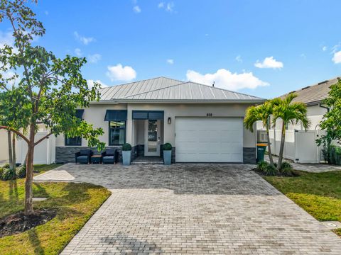 Photo of 828 100th Ave N Ave, Naples, FL 34108 (MLS # 11729106)