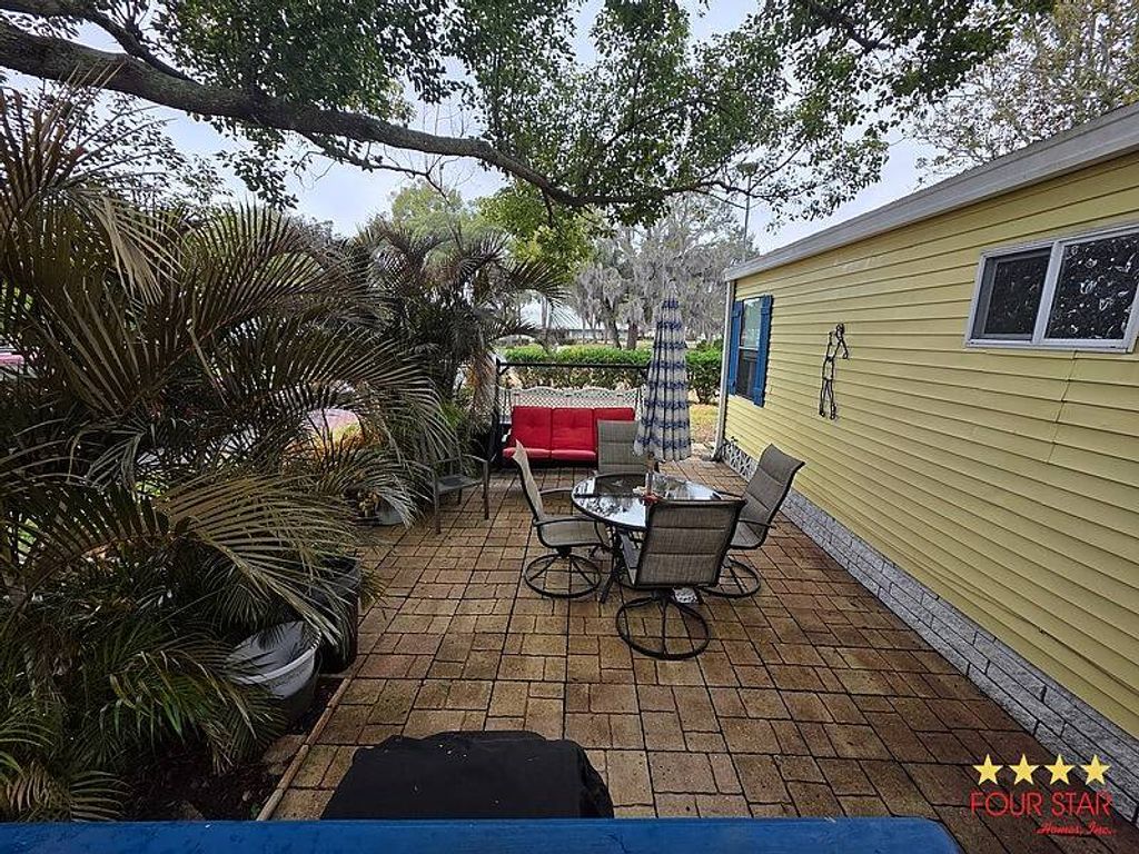 Photo of 177 Buccaneer Dr, Leesburg, FL 34748 (MLS # 11652423)