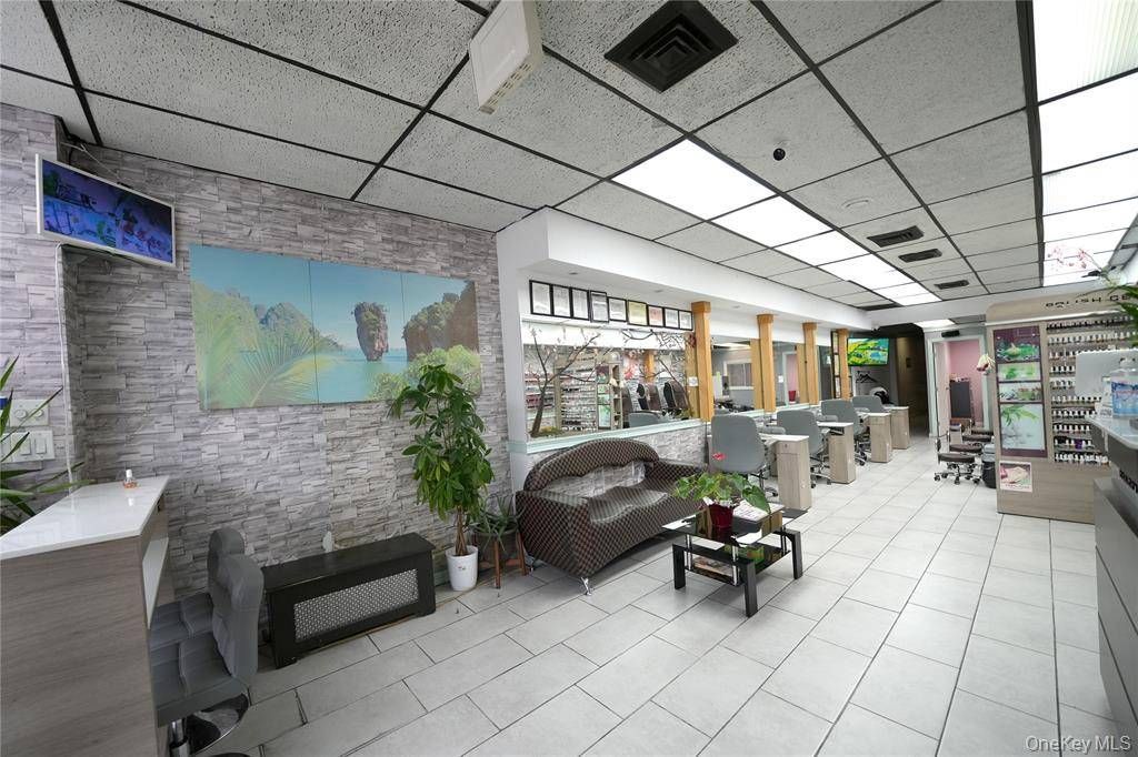 Photo of 11617 Queens Boulevard, Forest Hills, NY 11375 (MLS # 11652366)