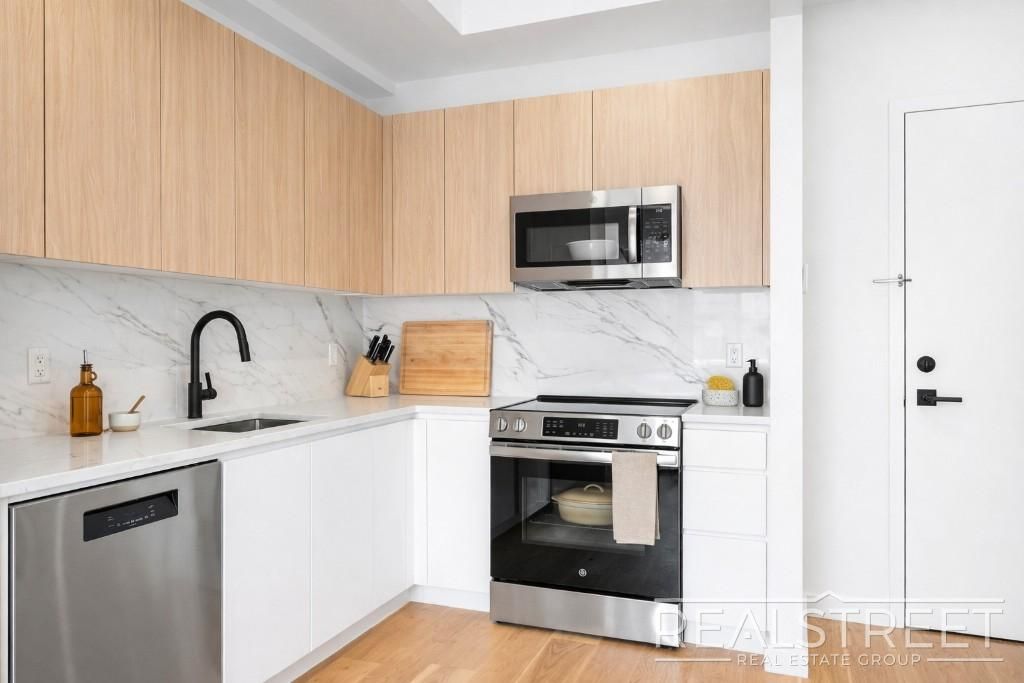 Photo of 105 Rogers Avenue #5A, BROOKLYN, NY 11216 (MLS # 11732422)