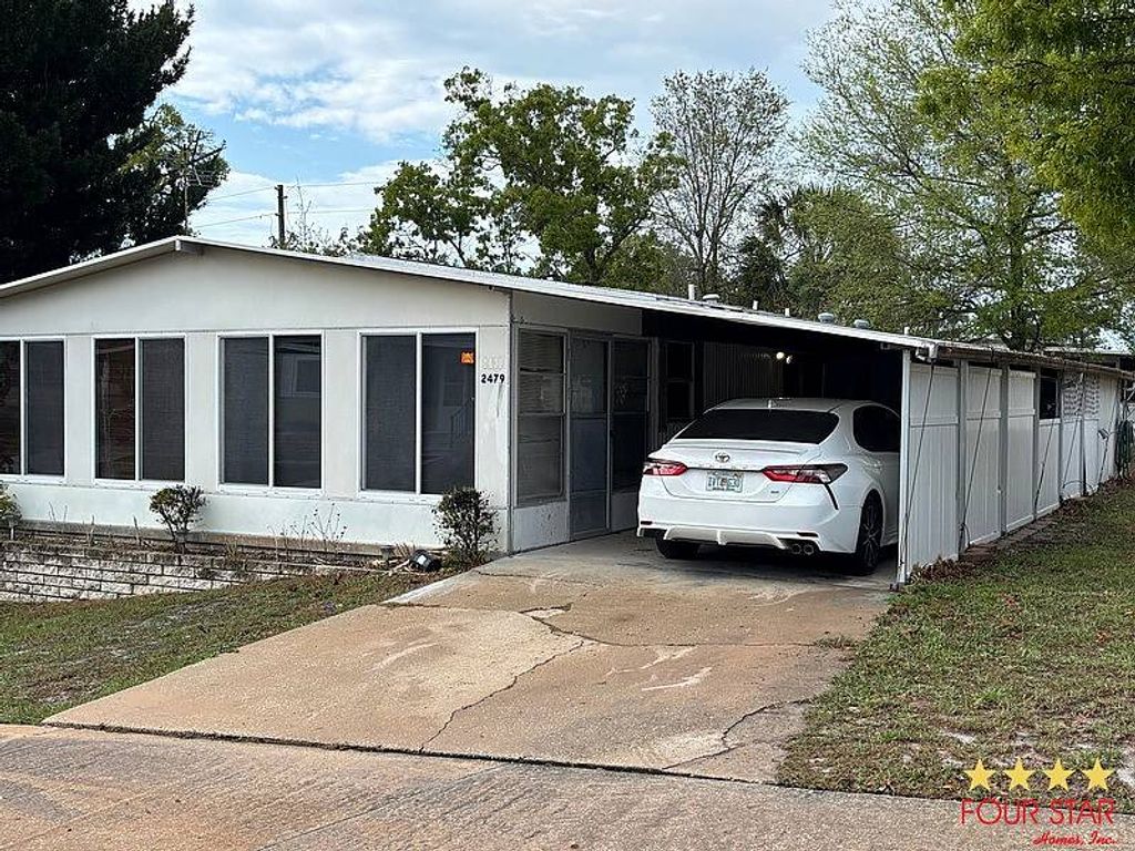 Photo of 2479 Greenhedge Dr, Orange City, FL 32763 (MLS # 11683378)