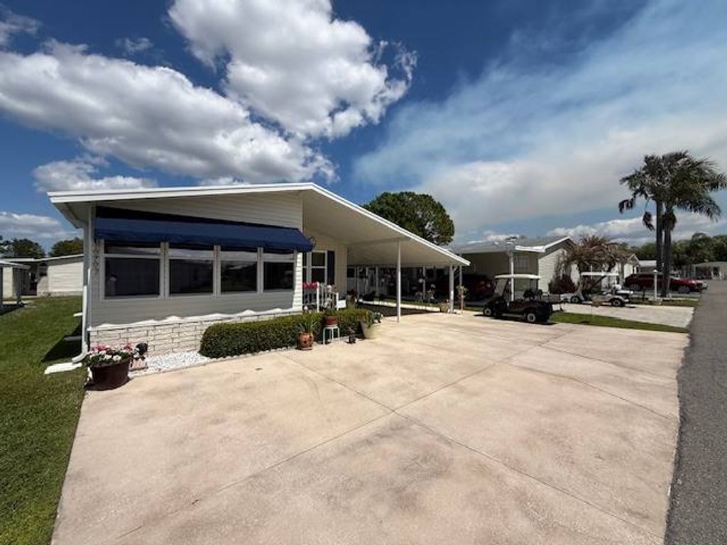 Photo of 10703 Lowell Drive, Lake Wales, FL 33898 (MLS # 11677405)