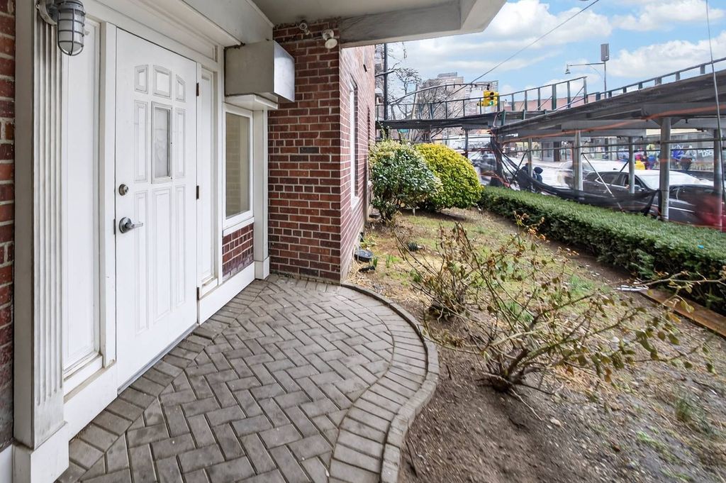 Photo of 14205 Roosevelt Ave #108, Flushing, NY 11354 (MLS # 11669621)