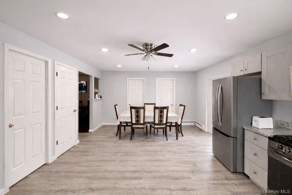 Photo of 19 Rutland Road, Mastic, NY 11950 (MLS # 11651243)