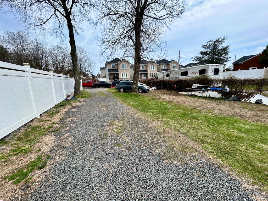 Photo of 1 Milburn Street, Staten Island, NY 10306 (MLS # 11684191)