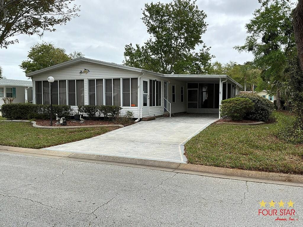 Photo of 15 Green Forest Dr, Ormond Beach, FL 32174 (MLS # 11684214)