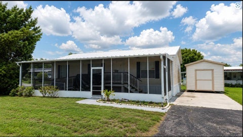 Photo of 1550 Parkgate Dr, Kissimmee, FL 34746 (MLS # 11846491)