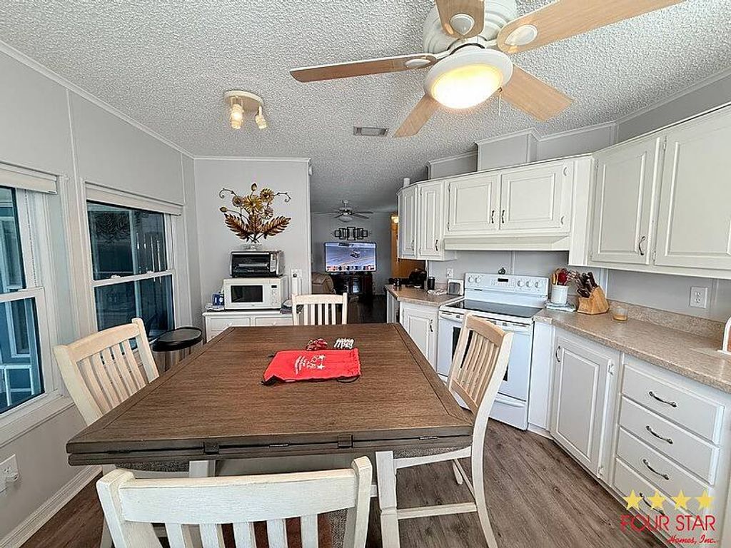 Photo of 918 Reed Canal Rd #342, South Daytona, FL 32119 (MLS # 11641646)