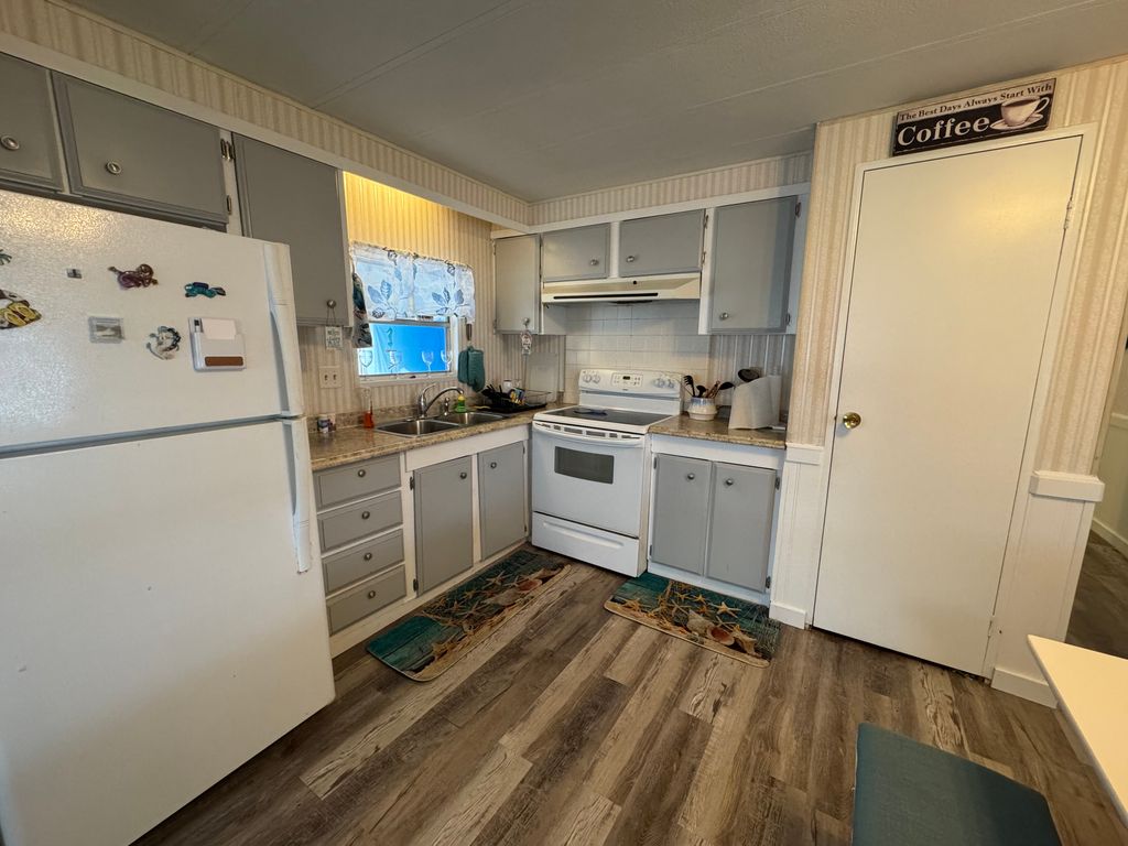 Photo of 29 Pelican Dr, New Smyrna Beach, FL 32168 (MLS # 11622446)