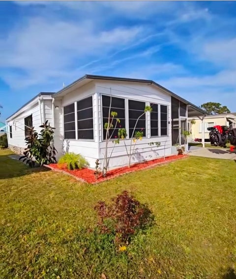 Photo of 14 New York Dr, New Smyrna Beach, FL 32168 (MLS # 11691571)