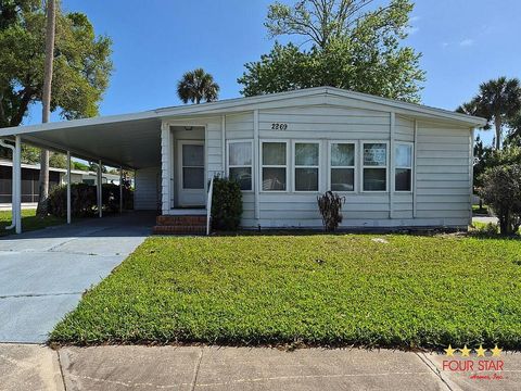 Photo of 2269 Mariposa Ave, Port Orange, FL 32129 (MLS # 11684941)