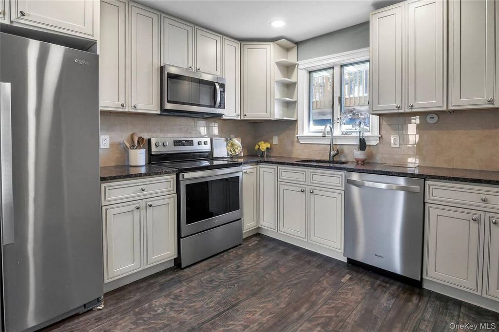 Photo of 7 Miller Drive, Lake Grove, NY 11755 (MLS # 11655061)