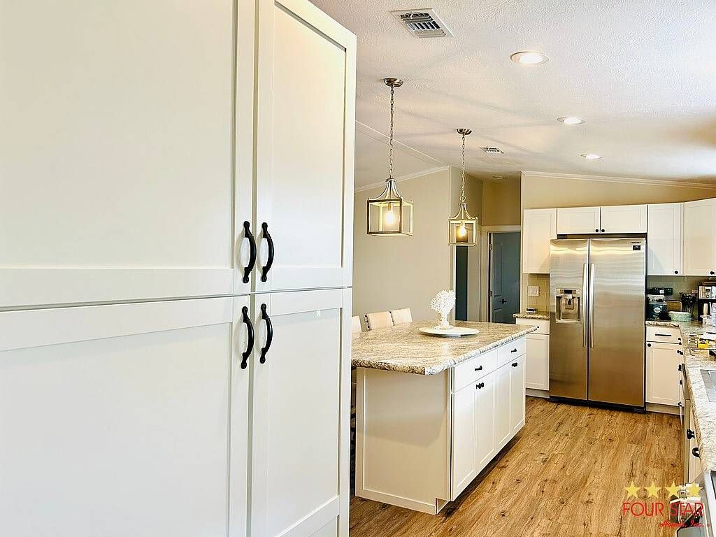 Photo of 25817 Espanola Dr, Leesburg, FL 34748 (MLS # 11622949)