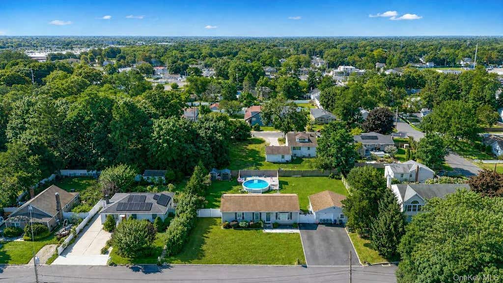 Photo of 28 Mapleton Avenue, Farmingville, NY 11738 (MLS # 11933107)