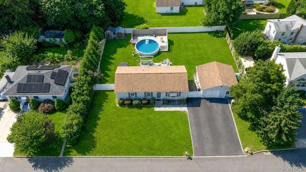 Photo of 28 Mapleton Avenue, Farmingville, NY 11738 (MLS # 11933107)